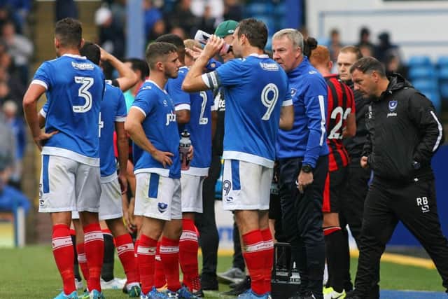 Kenny Jackett, right, with his team during Saturday's friendly with Bournemouth Picture: Shaun Boggust