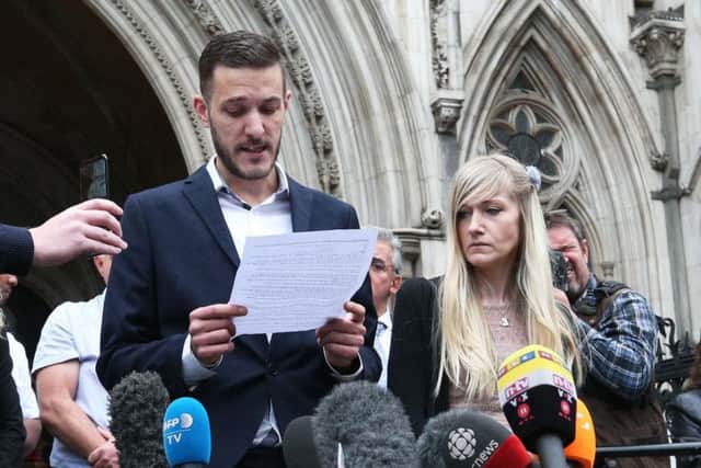 Charlie's parents outside the High Court
