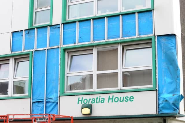 Cladding being removed from Horatia House and Leamington House.
Picture: Sarah Standing