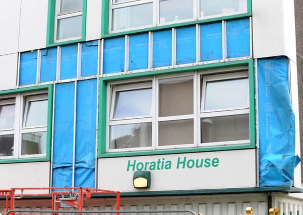 Cladding being removed from Horatia House and Leamington House.

Picture: Sarah Standing