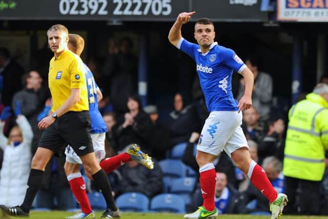 Liam Walker celebrates after scoring a penalty for Pompey against Carlisle in 2012
