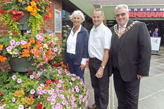 South and South East In Bloom judges Fiona Phillips and Stuart Lees with Mayor of Fareham Councillor Geoff Fazackarley. Picture: Ian Hargreaves  (170760-1)