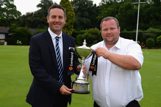 Portsmouth duo James Green and amateur Tim Higgs celebrate their win at Walton Heath
