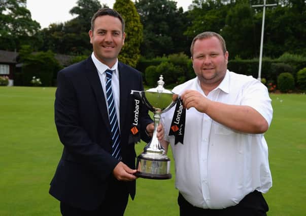 Portsmouth duo James Green and amateur Tim Higgs celebrate their win at Walton Heath