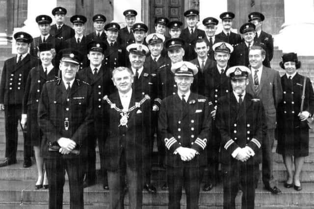Some of the fire crews along with officers who assisted in the Pacific Glory disaster