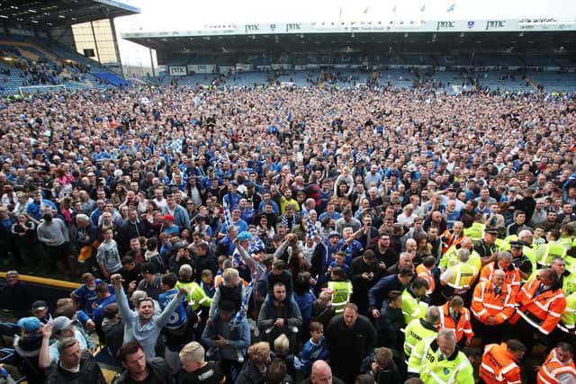 The Fratton faithful celebrate the League Two title against Cheltenham