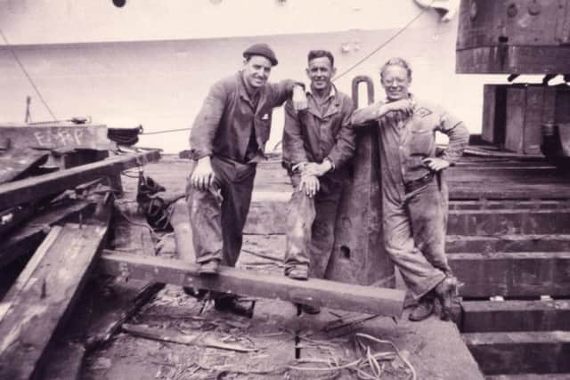 Workers take a break at the Dockyard