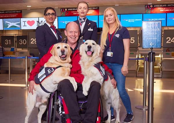 Allen Parton with EJ and Rookie at Manchester Airport Picture: Ian Morrison / DogstarPhoto.co.uk