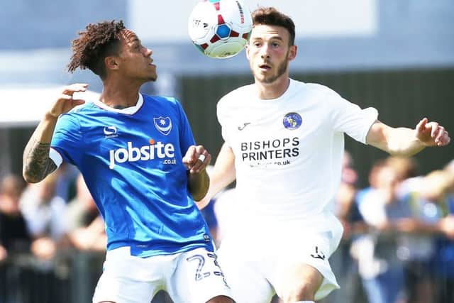 Bradley Tarbuck, right, in action against Pompey during pre-season. Picture: Joe Pepler