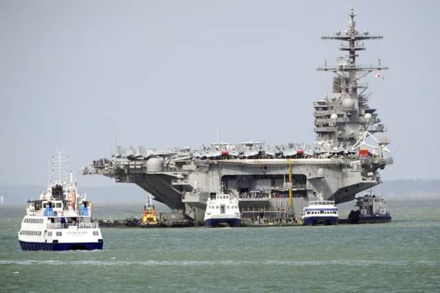 The USS George HW Bush at anchor in Stokes Bay, Gosport Picture: Malcolm Wells