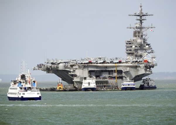 The USS George HW  Bush at anchor in Stokes Bay, Gosport     Picture:  Malcolm Wells