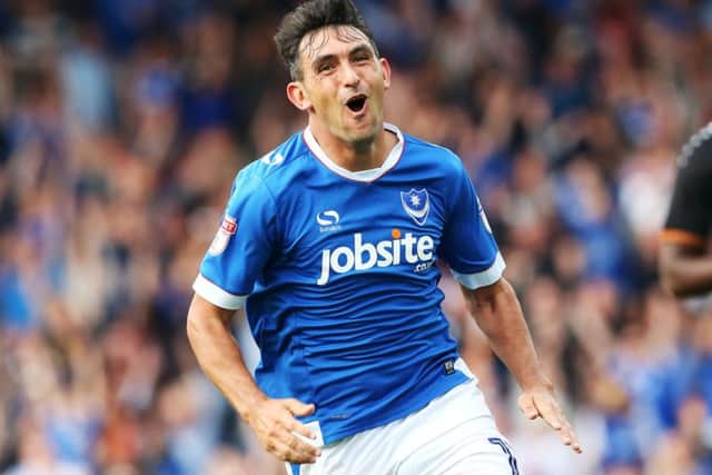 Gary Roberts celebrates his goal against Barnet. Picture: Joe Pepler