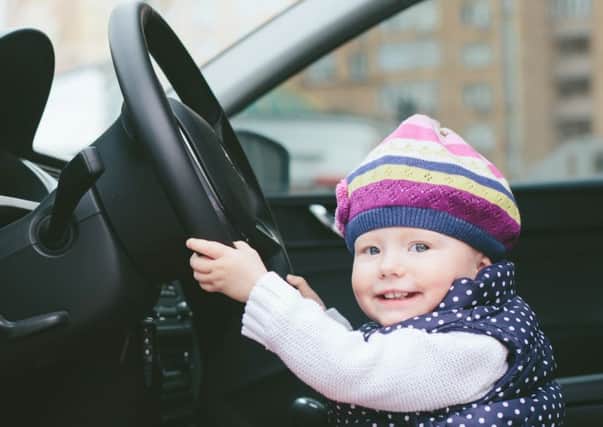Should parents really teach kids how to start up a car for fun?  			               (Shutterstock)