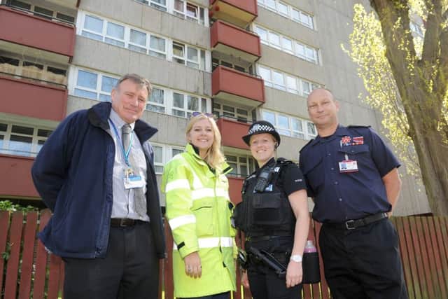 From left, Bryn Bashford, Portsmouth City Council fire safety advisor, Jasmin Myhill from Scottish and Southern Electricity Networks, special constable Kim Braddock and watch manager Stuart Damen, fire safety inspector.Picture: Sarah Standing