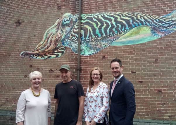 A mural of a cuttlefish was unveiled at the City Museum in Portsmouth to celebrate National Marine Week.
