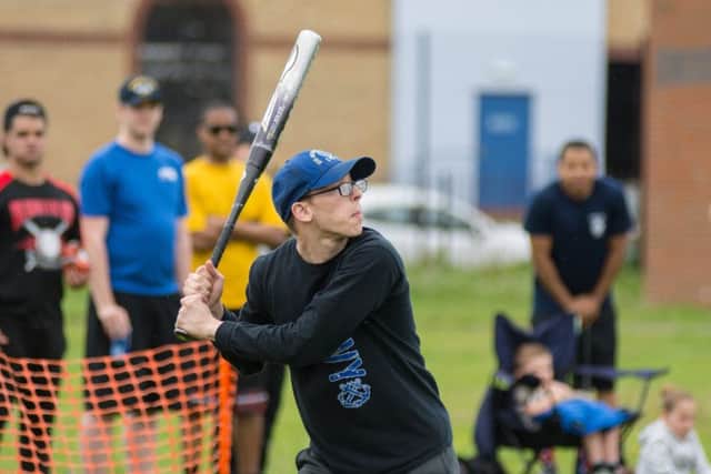 Sailors from aircraft carrier USS George HW Bush played a friendly softball match against a collection of Solent Softball League Players - US batting PPP-170729-215540006