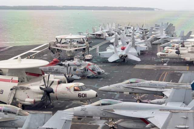 F18 Super Hornets on the flight deck of USS George H W Bush 

Picture: Mark Rutley