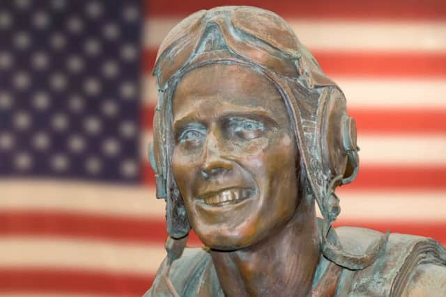 A bronze bust of president George H W Bush, after whom the warship is named            Picture: Mark Rutley