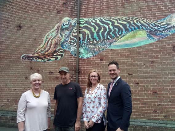 The cuttlefish mural by artist ATM was unveiled on Saturday