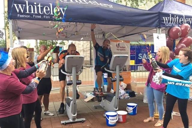 Simon Finch and David Bartram in action on their exercise bikes