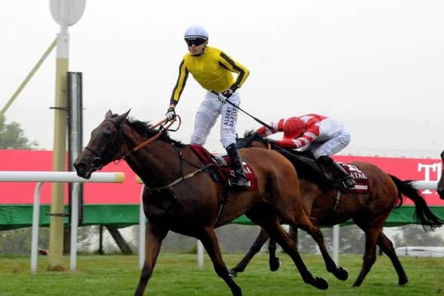 Big Orange and Jamie Spencer win the 2016 Goodwood Cup. Picture by Kate Shemilt