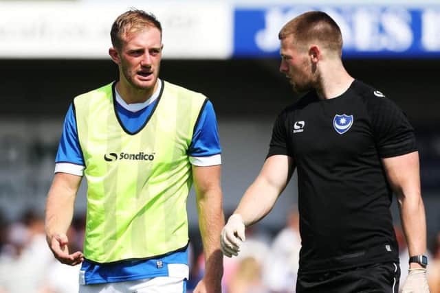 Matt Clarke, left, has been injured since the pre-season friendly against the Hawks