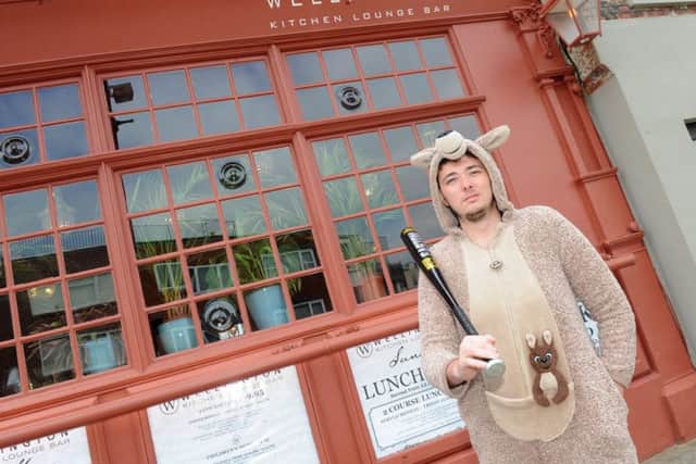 Jack Preston (23) from Old Portsmouth, was armed with a baseball bat and wearing his kangaroo onesie when he chased off a raider  Picture: Sarah Standing (170964-5704)
