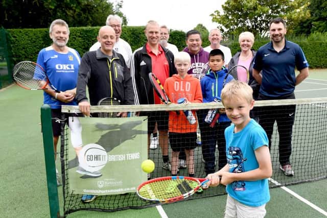 Tristan Oliver, seven, with, far right, Simon Johnson, LTA head of region for the south west and Cllr Linda Symes