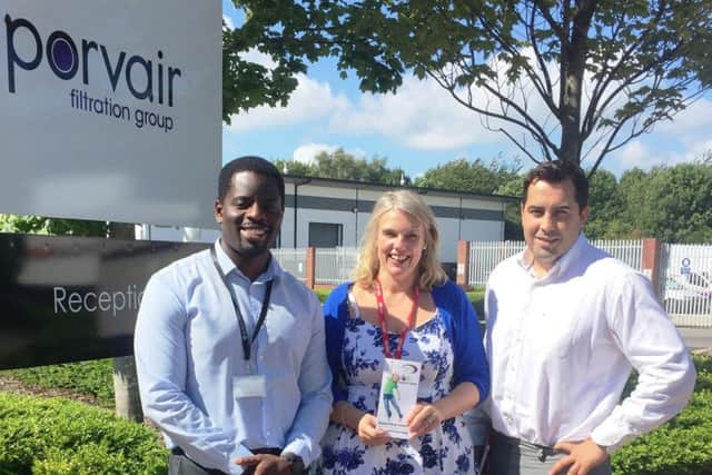 Team captains Toki Ogunkolati (left) and Ryan Nair, with Sam Tanner from Wave 105 Cash for Kids.