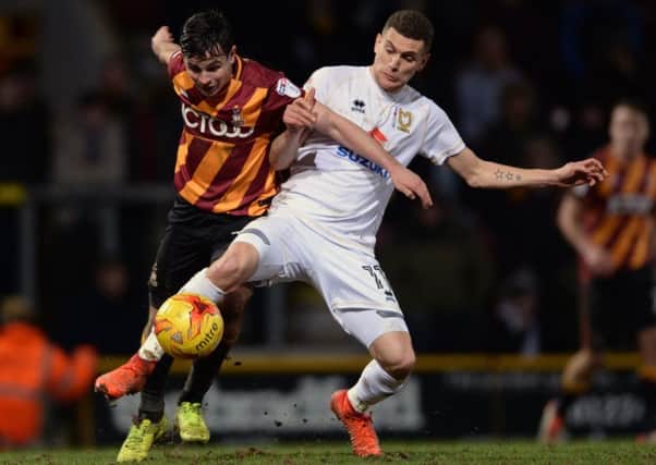 Stuart O'Keefe, right, in action for MK Dons against Bradford last season Picture: Bruce Rollinson