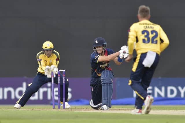 Mason Crane bowls Joe Denly. Picture: Neil Marshall