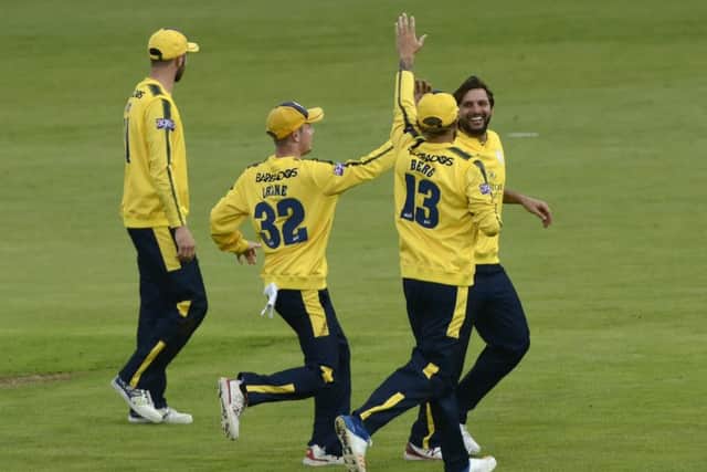 Shahid Afridi celebrates one of his four wickets. Picture: Neil Marshall