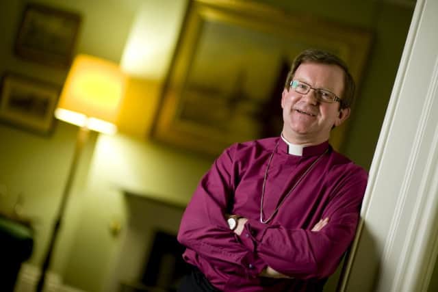 Bishop Christopher urges people to shake vicars hands