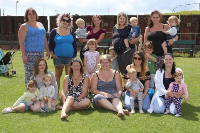 Hana Young and all the mums and children in the support group Picture: Habibur Rahman