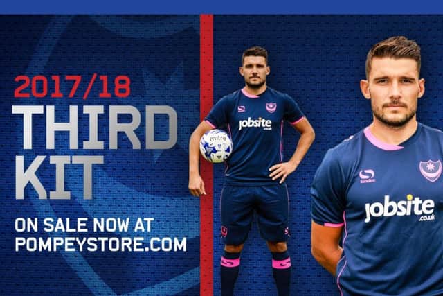Gareth Evans models Pompey's new third kit