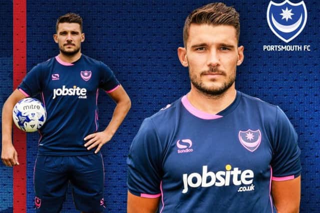 Gareth Evans models Pompey's new third kit