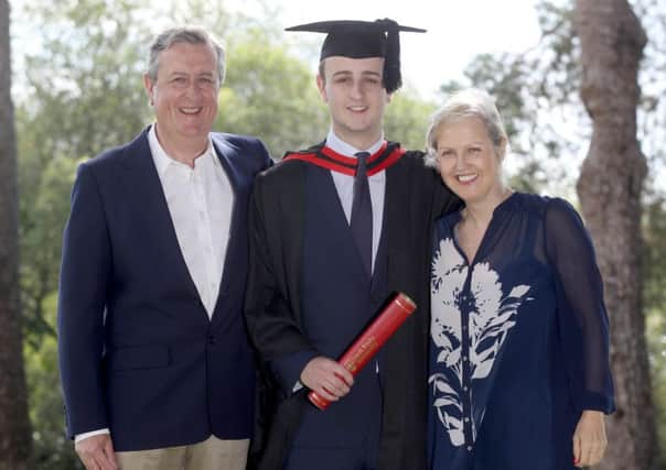 Dad David Podger, Tommy Podger and mum Lizzie at Petersfield Heath for the second graduation