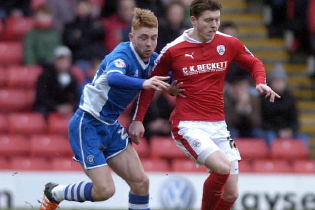 Rochdale's Callum Camps, left