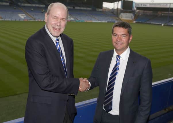 New Pompey owner Michael Eisner, left, with chief executive Mark Catlin Picture: Habibur Rahman