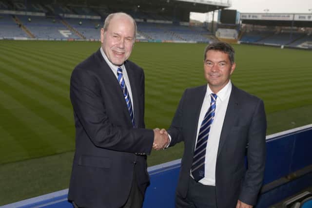 Michael Eisner with Mark Catlin at Fratton Park. Picture: Habibur Rahman