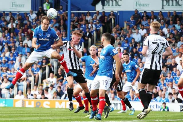 Pompey's Brett Pitmann heads at goal during their 2-0 win against Rochdale at Fratton park today. Picture: Joe Pepler/Digital South