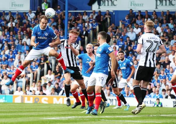 Pompey's Brett Pitmann heads at goal during their 2-0 win against Rochdale at Fratton park today. Picture: Joe Pepler/Digital South