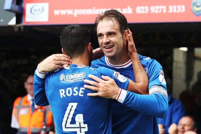 Brett Pitman celebrates his second goal with Danny Rose. Picture: Joe Pepler