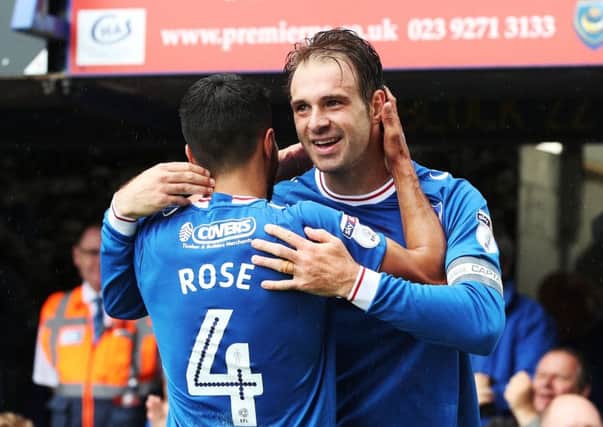 Brett Pitman celebrates his second goal with Danny Rose. Picture: Joe Pepler