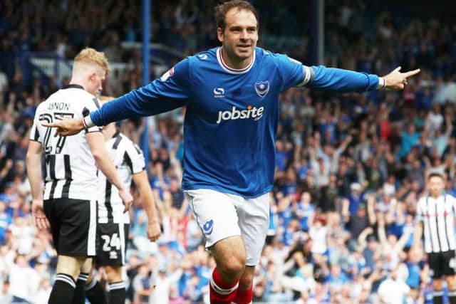 Brett Pitman celebrates his opening goal. Picture: Joe Pepler