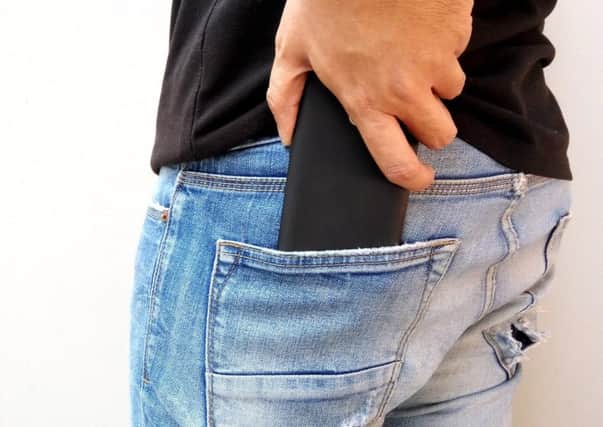 Tight jeans and mobile phones. Do they affect men's fertility?