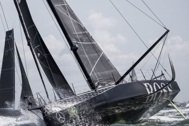 HugoBoss IMOCA Open 60 race yacht skippered by Alex Thomson during the start of the 2017 Rolex Fastnet Race. Picture: Lloyd Images