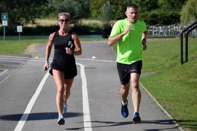 Julie Allan and Alex Millham complete the parkrun on Saturday. Picture: David Johns