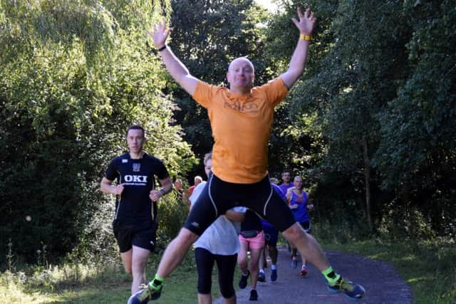 Del Roberts shows his skills and flexibility at Portsmouth Lakeside parkrun. Picture: David Johns