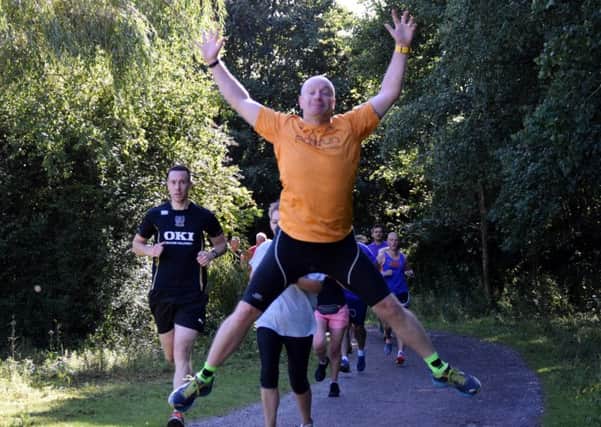 Del Roberts shows his skills and flexibility at Portsmouth Lakeside parkrun. Picture: David Johns